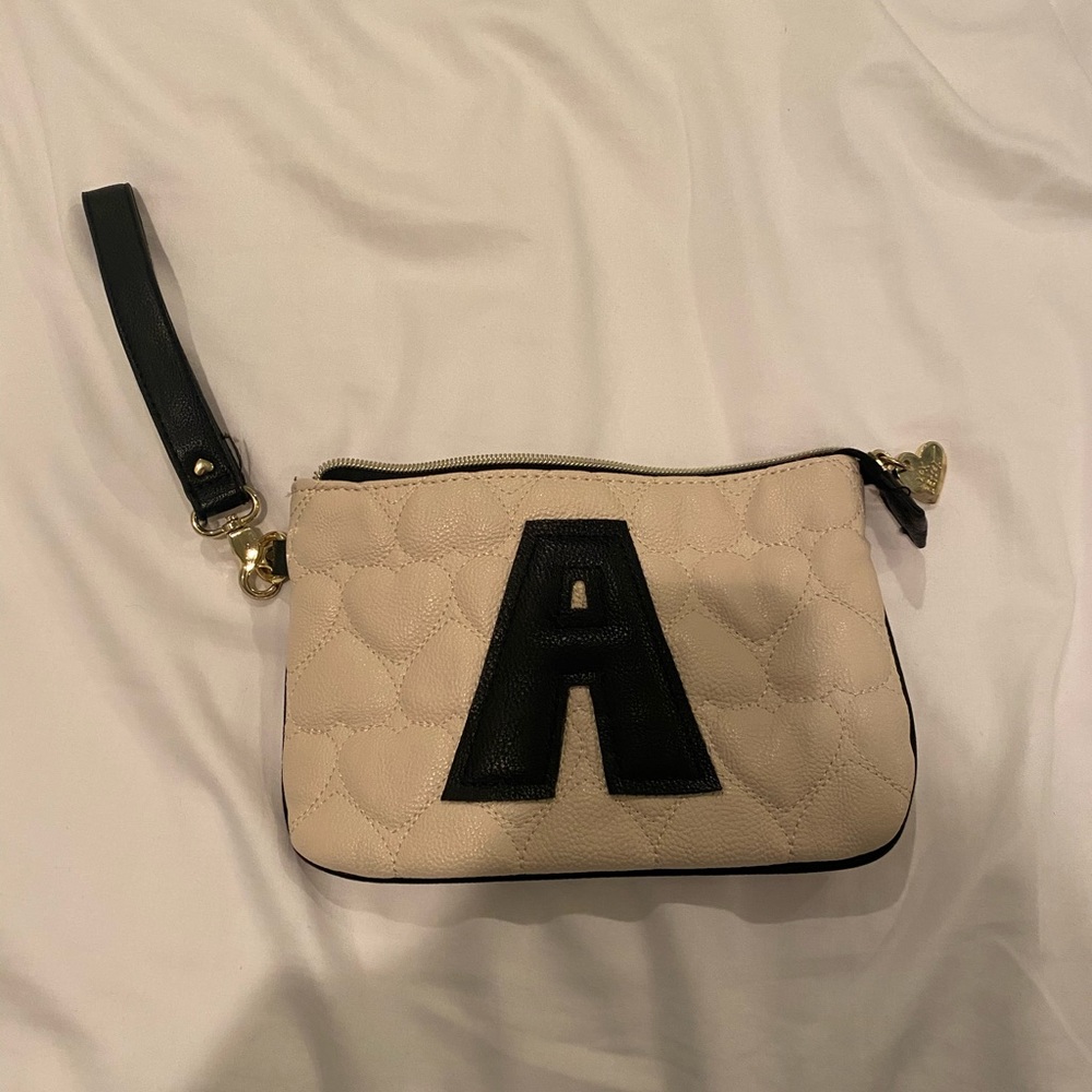 Betsey Johnson cream Wristlet with Black A